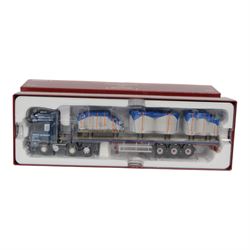 Two Corgi Hauliers of Renown 1:50 scale diecast model lorries, comprising CC15301 Scania 111 Tandom Axle Box Van Montgomery Transport and CC14112 DAF 105 Flatbed & Cement Block Load Keith Murray Transport, both boxed