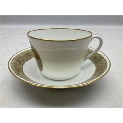 WW2 Nymphenburg cups and saucer, decorated with Imperial German Iron Cross encircled in a foliate boarder with gilt edging, with printed mark beneath 