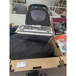 Collection of photography equipment, including flashes, hoods, filters, telephoto lens, bags, etc