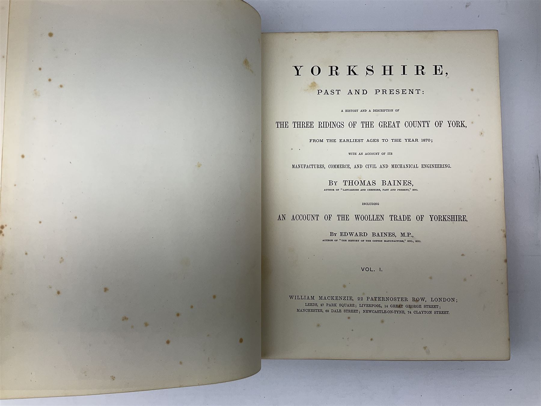 Baines Thomas: Yorkshire, Past and Present. Four volumes. Engraved plates. Decorative maroon cloth/gilt binding with all edges gilt.