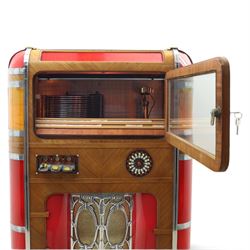 Rudolf Wurlitzer Company - Model 616 'Simplex' 1937 jukebox, figured walnut veneered cabinet with illuminated red and amber side panels enclosed by chromed uprights, glazed upper record compartment, cast Art Deco speaker grille, coin-operated push-button selection panel with circular title index, raised on a moulded base