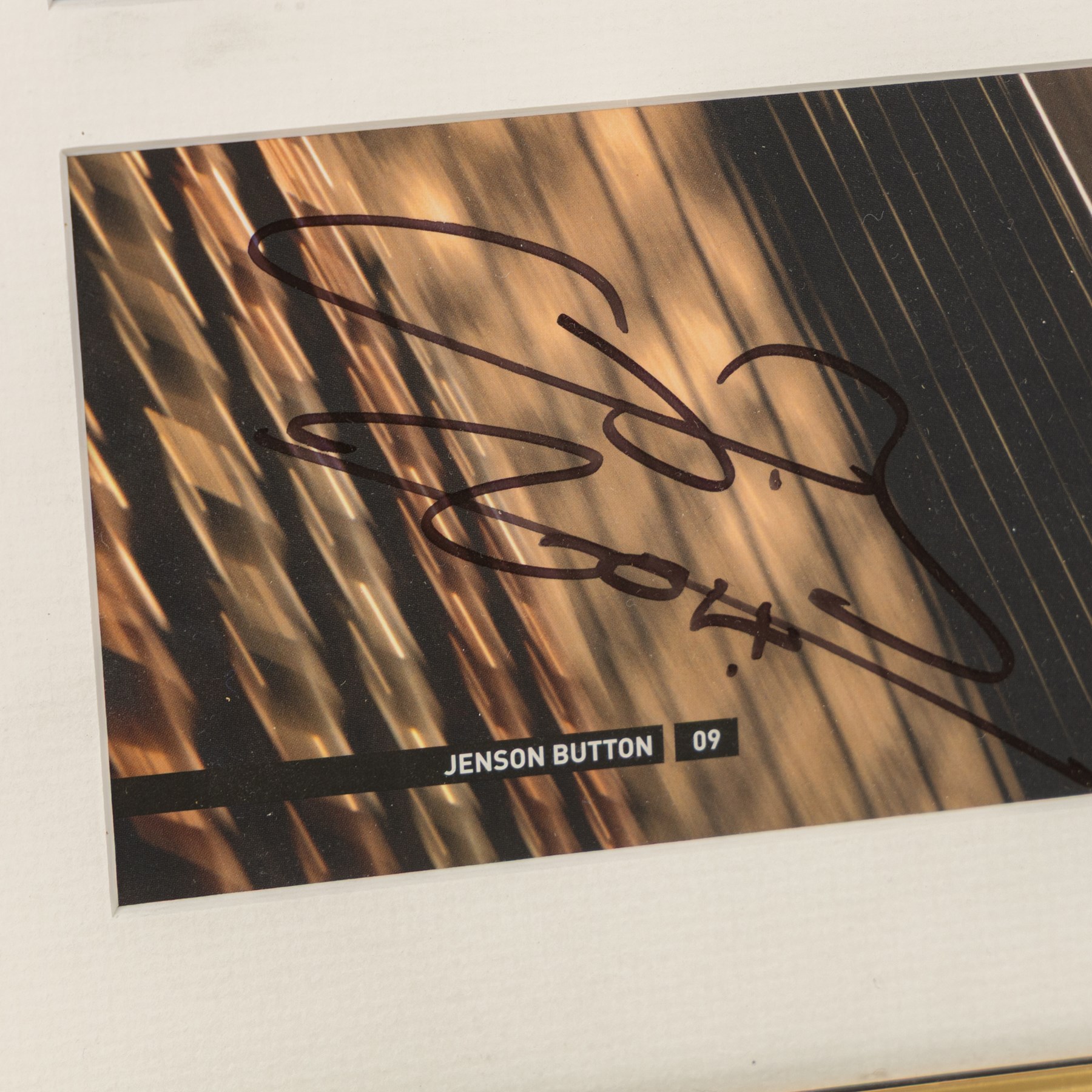 Ten signed Formula 1 photographs, comprising eight Damon Hill examples, Jenson Button and a Nigel Mansell example, nine with certificates of authenticity from Write Stuff Autographs, all framed, largest H47cm, W67cm