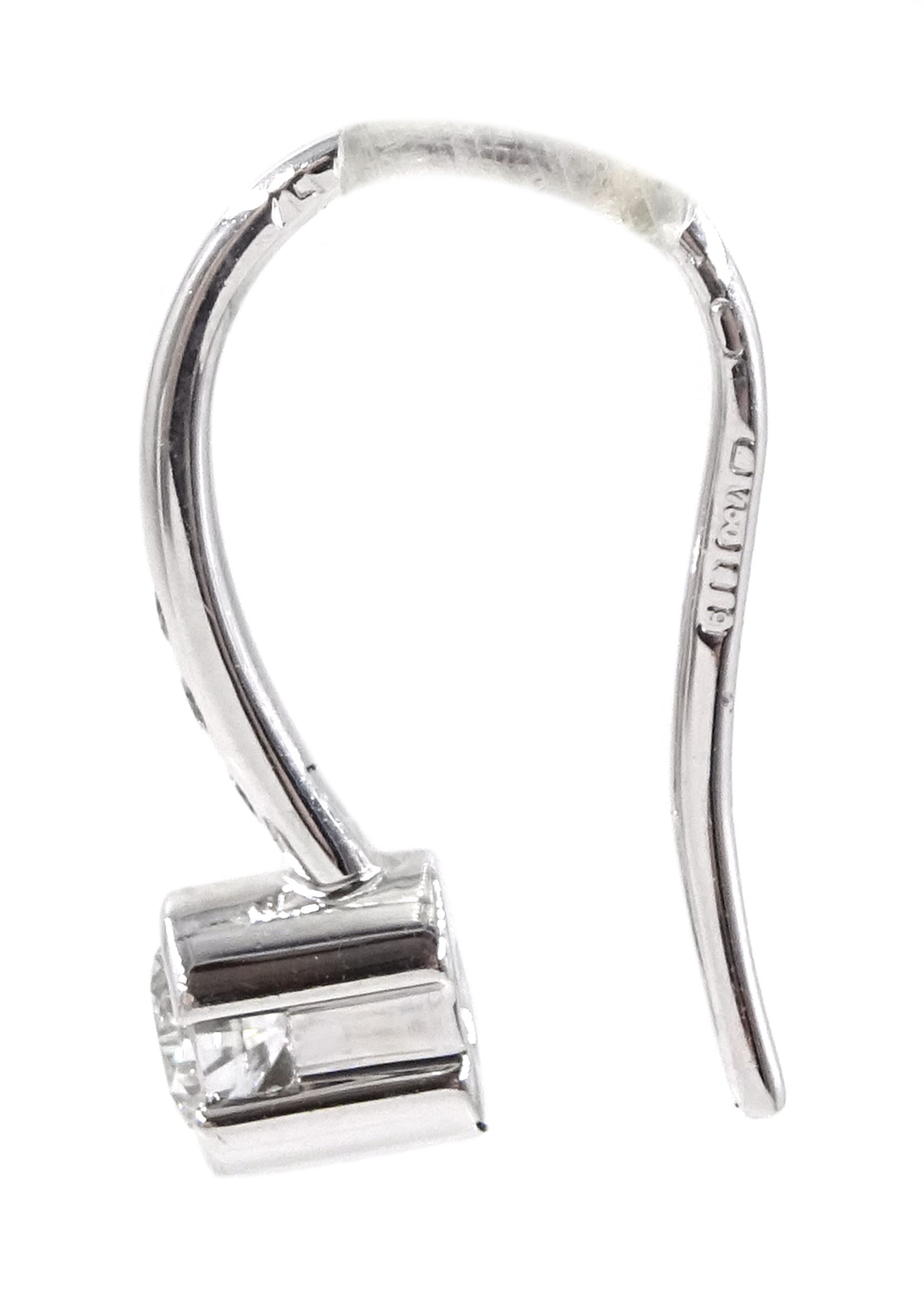Pair of 18ct white gold diamond pendant half bezel set earrings, hallmarked, total diamond weight approx 0.26 carat