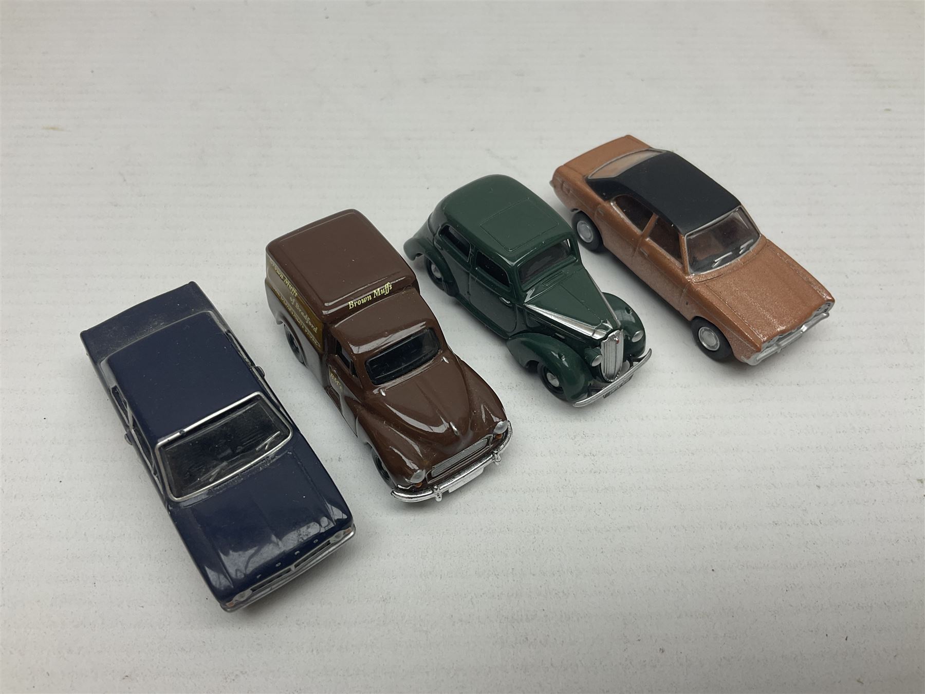 Over forty 1:76 scale die-cast models of cars and commercial vehicles; some boxed; and eight small scale models of motorcycles; all unboxed