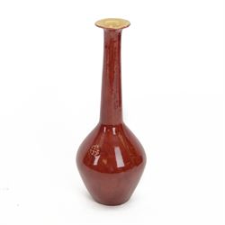 Early 20th century Jugenstijl vase by Aardewerkfabriek De Kat, Bergen op Zoom Pottery (1902-1918) attributed to Chris van der Hoef, of angular form with elongated tapering neck with flared rim, in pinkish red glaze with cross motif to the body, impressed marks beneath, H31cm