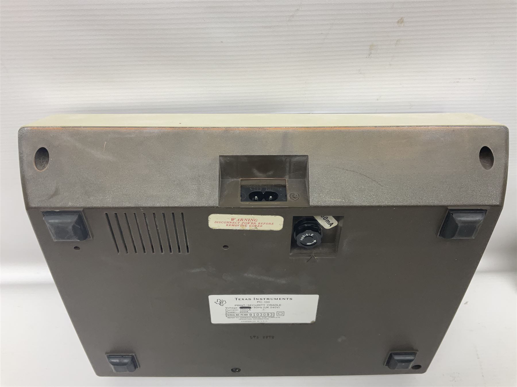 Four 1970s Sinclair electronic calculators - Cambridge in hard case with booklet; Scientific Programmable with Program Library and booklet; Scientific in hard case; and Oxford 300 in soft case with booklet; together with Texas PC-100 SR56 programmable slide-rule calculator on base station with readout, two booklets, keys and cover, serial no.9103093