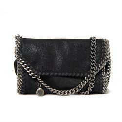 Stella McCartney Falabella black shaggy deer cross-body bag, the compact foldover design w...