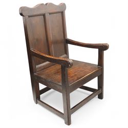 Early 18th century oak open armchair, high back with two recessed panels beneath scrolled ...