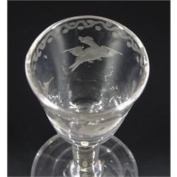 Small 18th century drinking glass of possible Jacobite interest, the funnel bowl engraved with bird in flight and sunflower, upon a plain stem and conical foot, H8.5cm