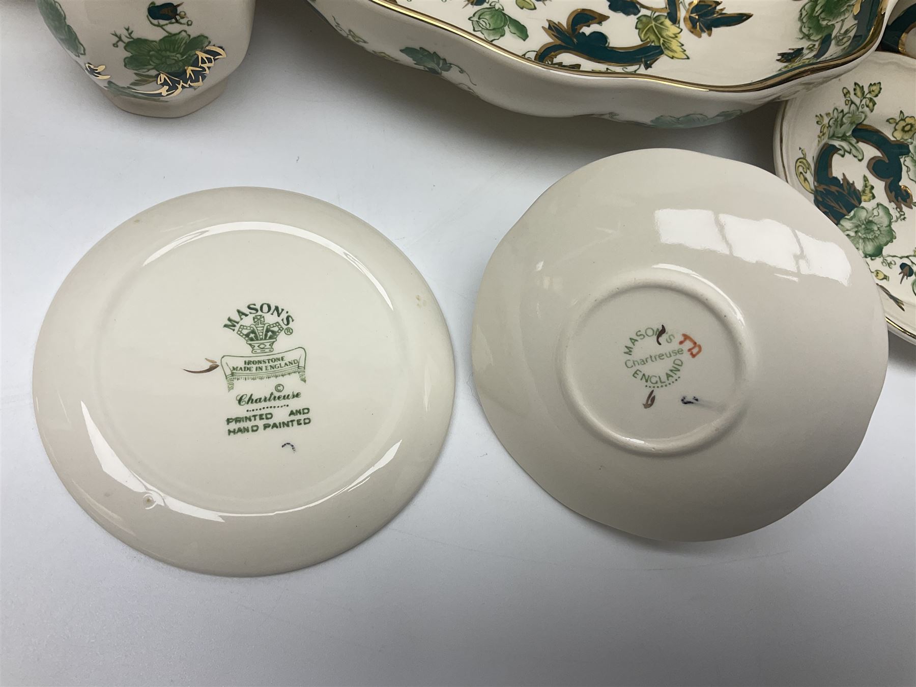 Collection of Masons Ironstone Chartreuse pattern, to include clock, six teacups, twin handled dish, ring dish, plates vases, etc, many with original boxes, clock H24cm 