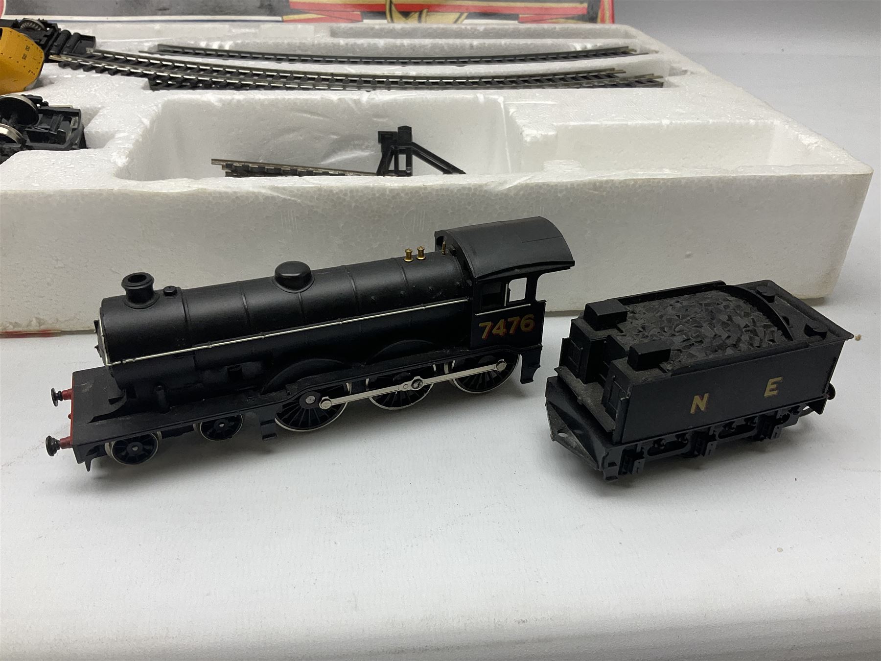 Hornby '00' gauge - Intercity 125 2-car set Nos.43010 & 43011 with one coach in original box with track and additional 4-6-0 locomotive and tender No.7476 and goods wagon; and another similar HST Intercity 125 2-car set Nos.43125 & 43126 with two coaches in original box with track and controller (2)