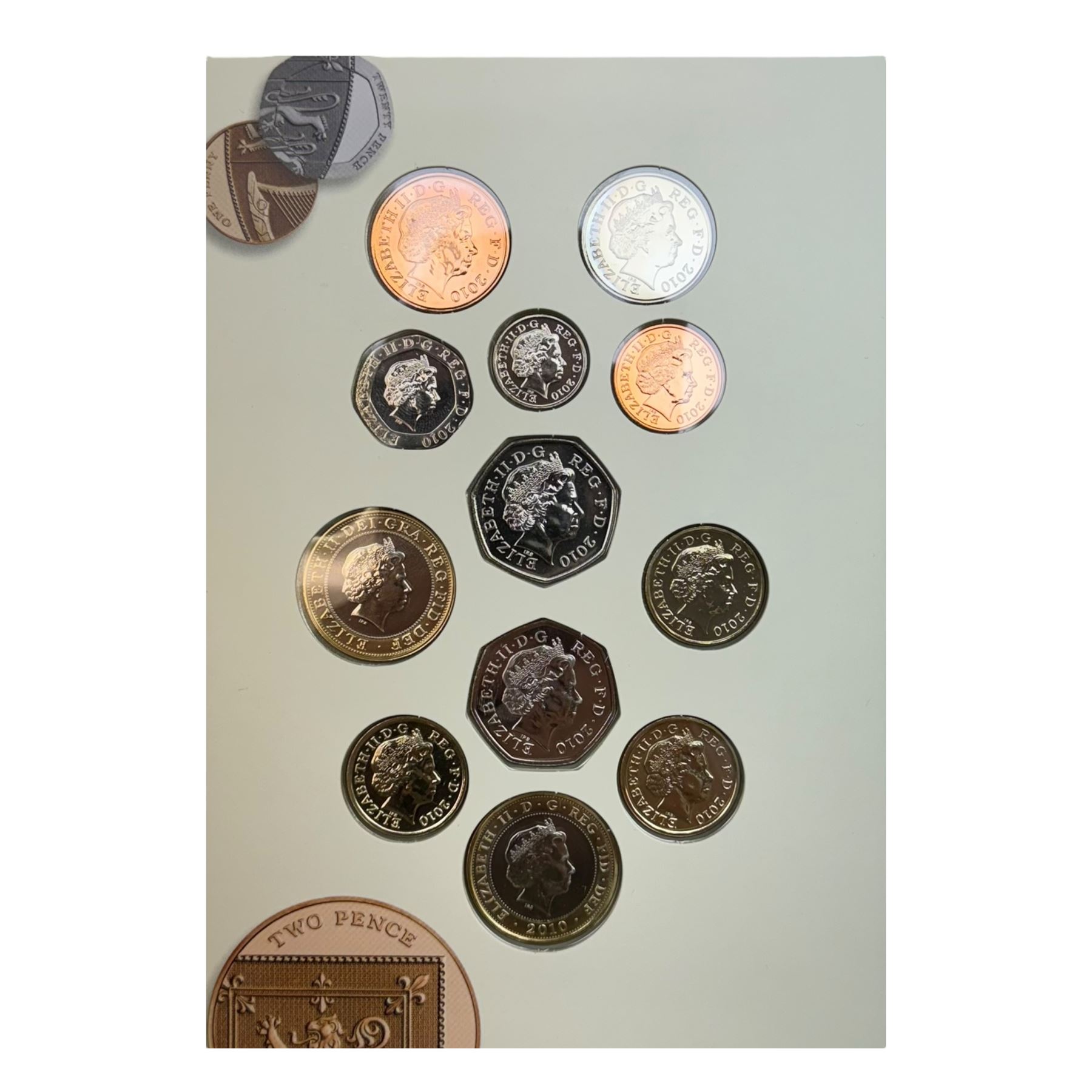 Six The Royal Mint United Kingdom uncirculated coins or sets, comprising  2008 'Queen Elizabeth I' five pounds, 2010 twelve coins, 2012 'Definitive' eight coins, 2013 'Definitive' eight coins, 2014 'Definitive' eight coins and 2015 'The Fourth Circulating Coinage Portrait Final Edition' eight coins, all in card folders