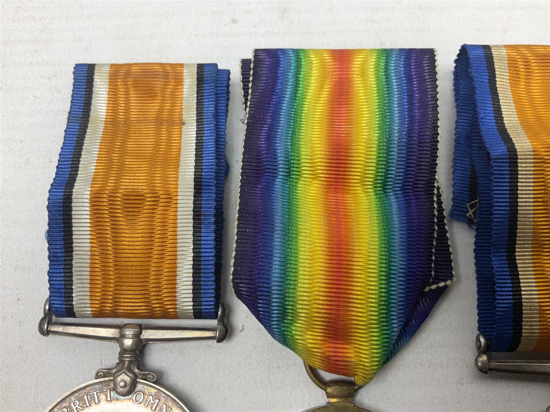 Family group of five WW1 medals for the East Yorkshire regiment comprising trio of 1914-15 Star, British War Medal and Victory medal awarded to 13-368 Pte. C. Padget; and British War Medal and Victory Medal to 201829 Pte. H.W. Padget; all with ribbons (5)