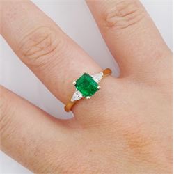 18ct gold three stone emerald and pear cut diamond ring, hallmarked, emerald approx 0.85 carat