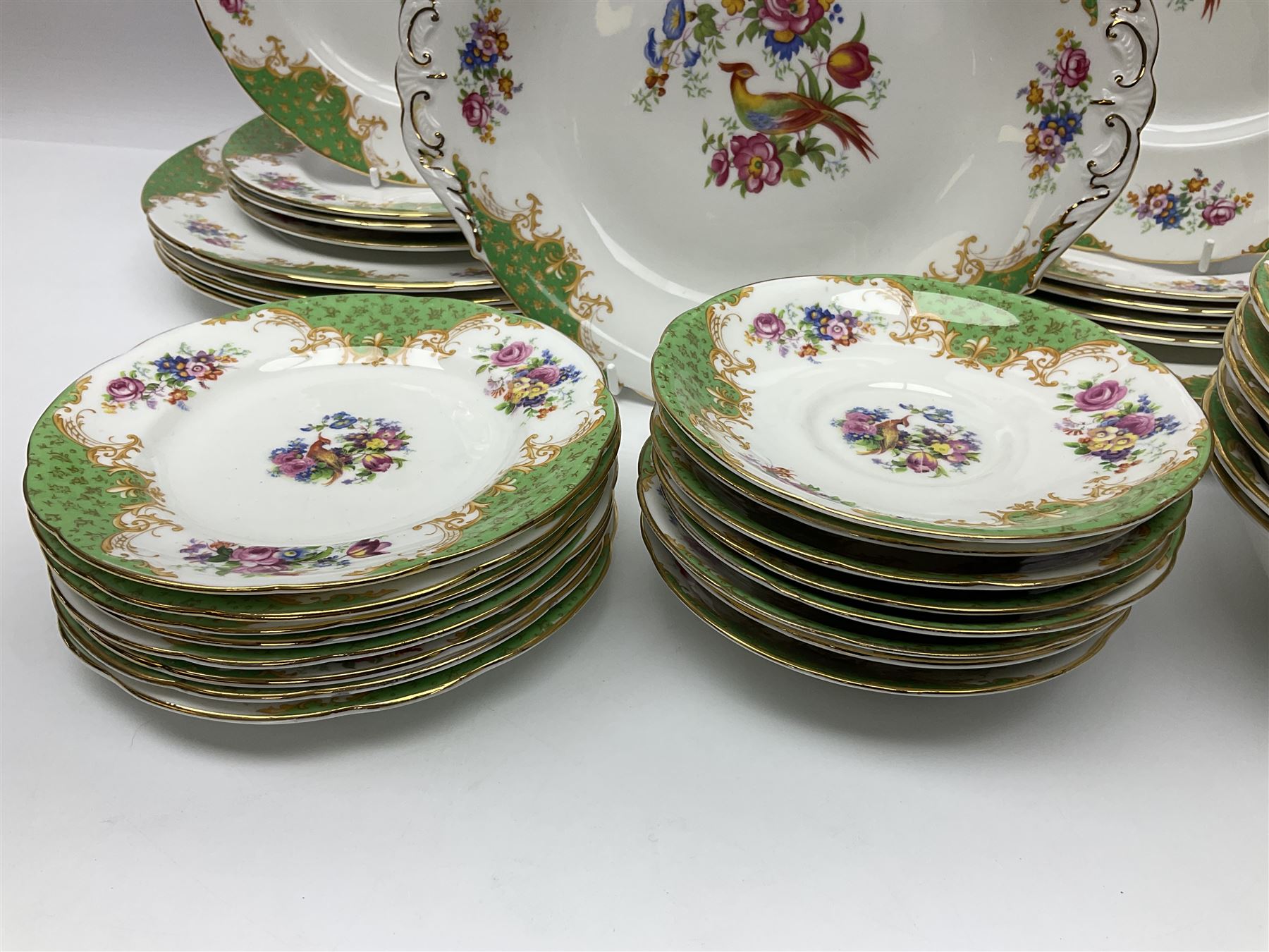 Paragon Rockingham pattern part tea and dinner service including eight cup and saucers of various sizes, eight dessert plates, eight dinner plates, etc (48)