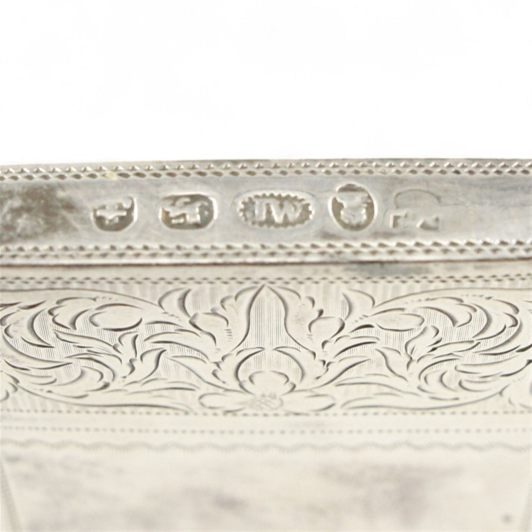 19th century silver card case engraved with scrolls and the crest of a tower and griffin 7cm x 4cm Birmingham assay circa 1830 Maker Joseph Willmore 