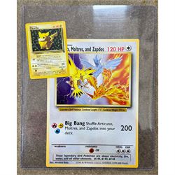 Collection of approximately 400 Pokemon trading cards, mostly 1999 Wizards Pokemon cards to include 1st Edition Dark Gyarados holo 8/82, Dark Charizard 4/82 holo and 21/82 non holo, Dark Blastoise 3/82 holo and 20/82 non holo, Dark Raichu holo 83/82, Dark Dragonite 22/82, eleven first edition cards, Japanese cards, Trainer cards, etc, together with an album of Pokemon the First Movie cards, a voice actor signed copy of Pokemon: The First Movie Animation Comics Mewtwo Strikes Back #1, 5305/8000 with certificate of authenticity with comics 2, 3 and 4 