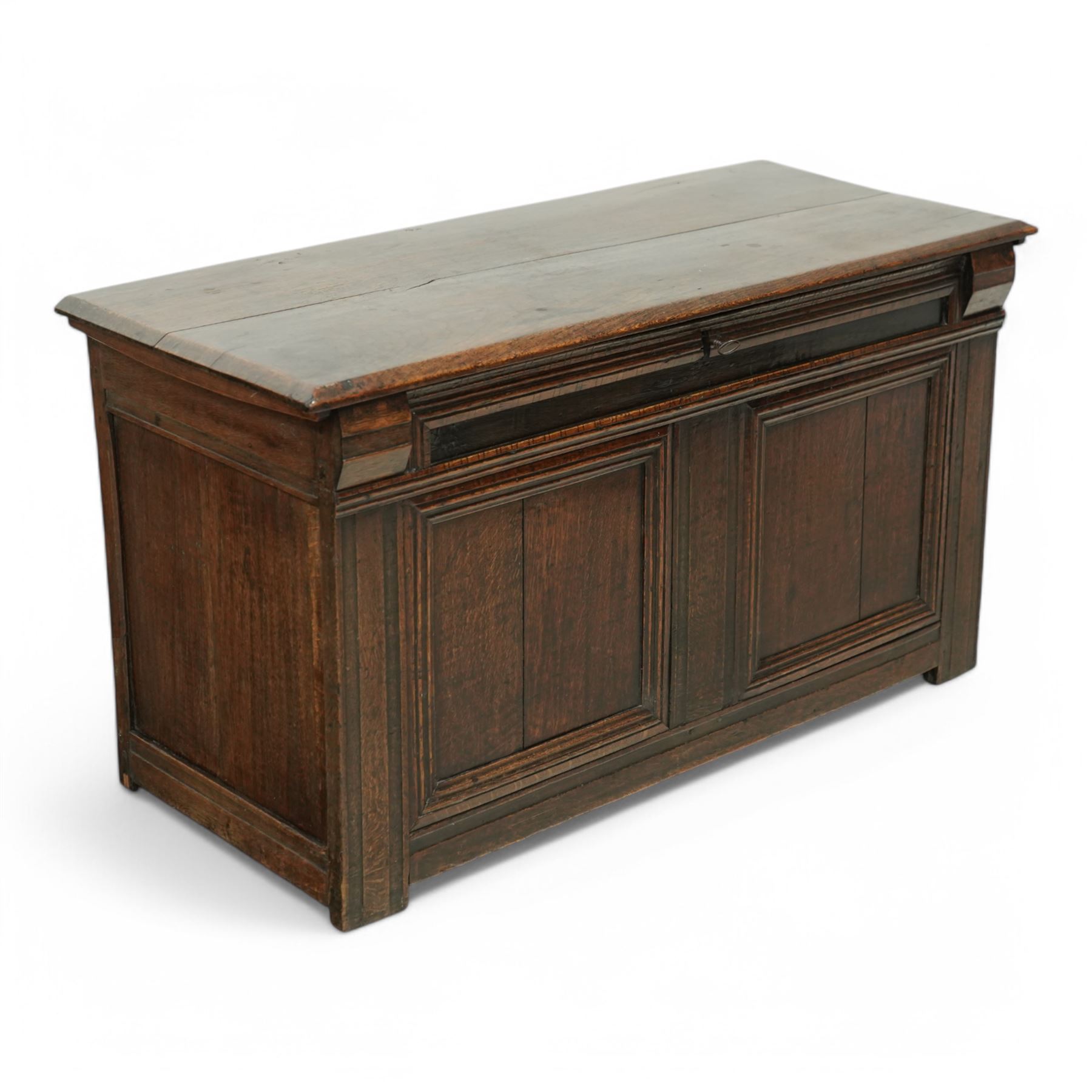 18th century oak blanket chest, chamfered rectangular hinged top over panelled front and sides, decorated with applied mouldings, on stile supports