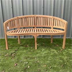 Solid teak serpentine garden bench - THIS LOT IS TO BE COLLECTED BY APPOINTMENT FROM DUGGLEBY STORAGE, GREAT HILL, EASTFIELD, SCARBOROUGH, YO11 3TX
