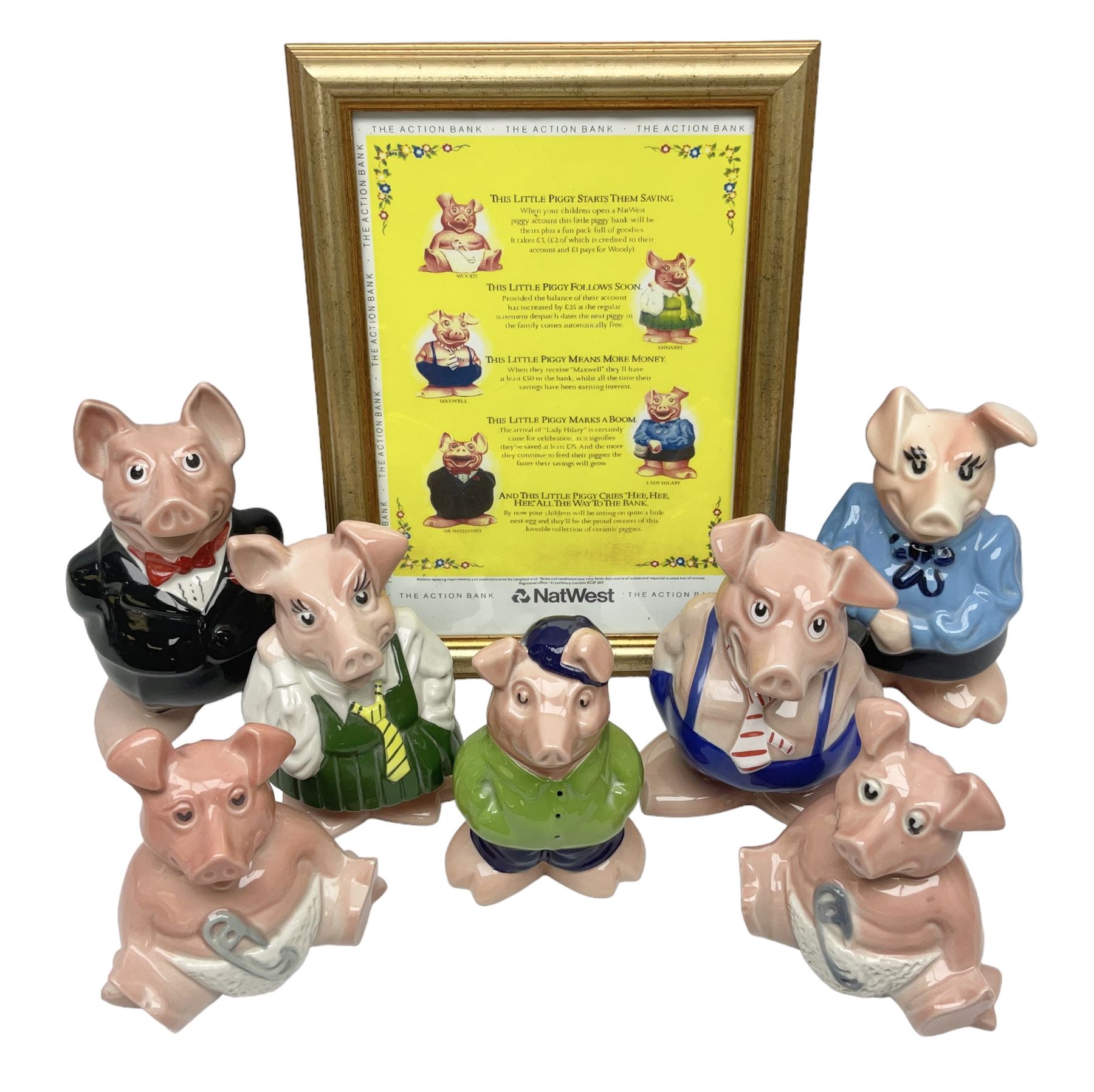  Full Set of Wade Natwest Pigs to include cousin Wesley, with an additional baby and framed leaflet 