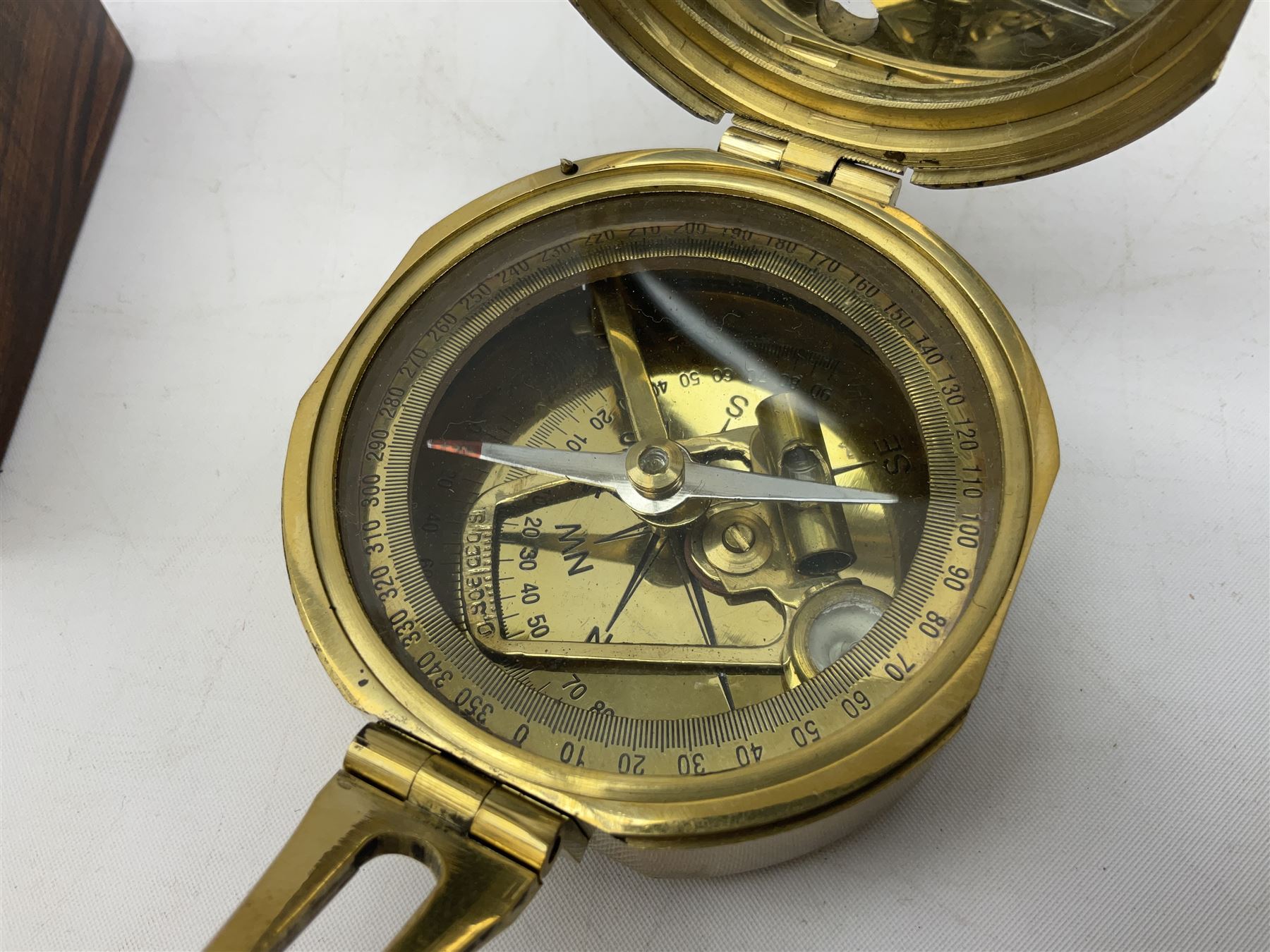 Brass compass marked Stanley London, in wood case