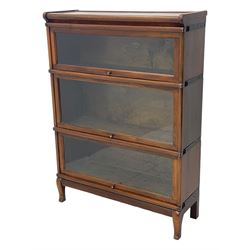 Globe Wernicke - early 20th century mahogany three-tier stacking library bookcase, three glazed sections enclosed by hinged and sliding doors, interior with transfer label, raised on cabriole front supports