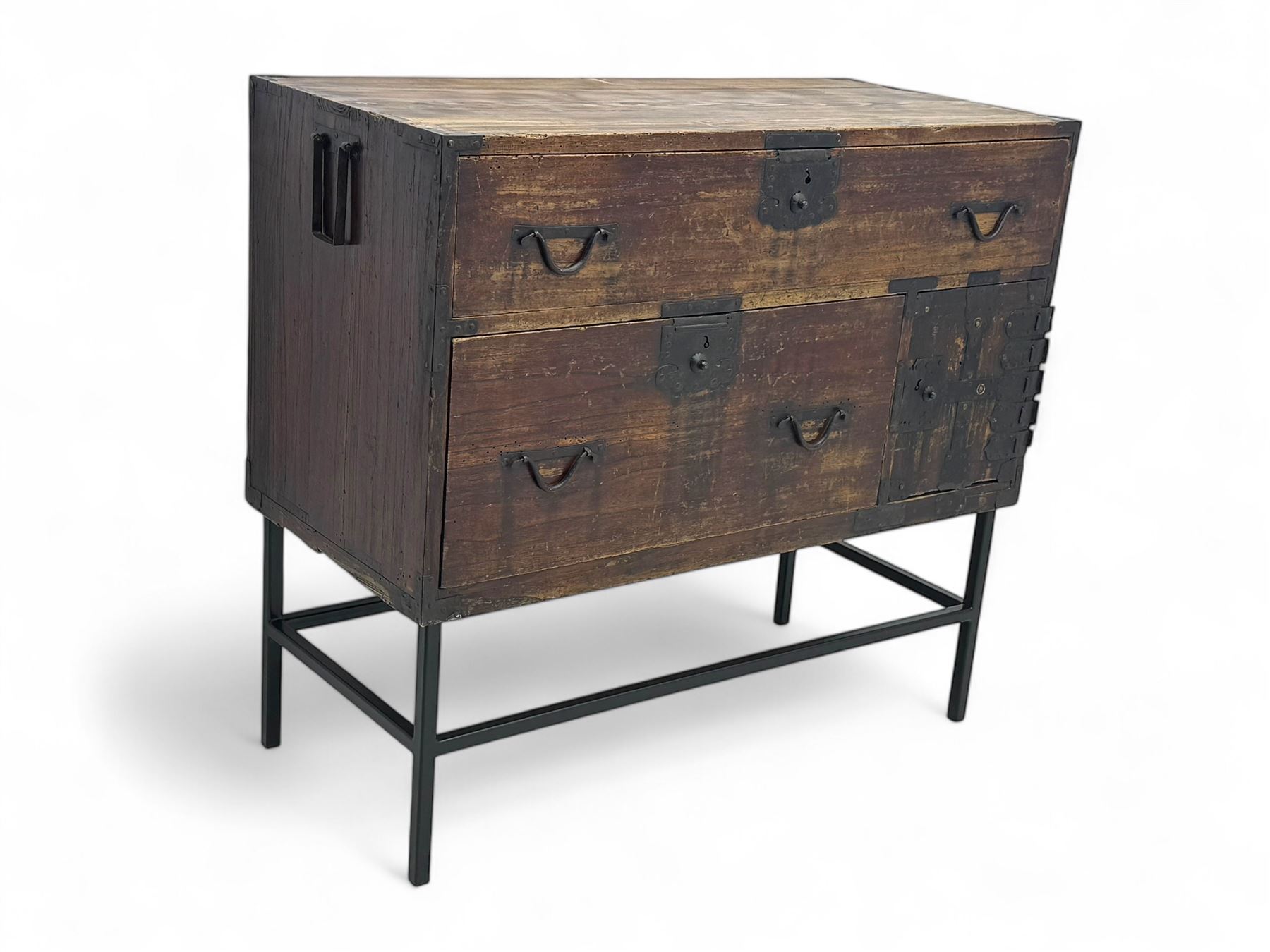 Late 19th century Japanese tansu chest, crafted with a cedar frame and cypress wood panels, original iron fittings throughout, comprising a single long drawer above smaller drawer and hinged cupboard door enclosing two smaller internal drawers and storage compartment, mounted on a bespoke black metal stand