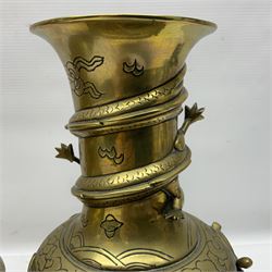 Pair of Chinese brass vases, of ovoid form with elongated neck and fluted rim, decorated in high relief with a dragon chasing a flaming pearl around the neck, the body with dragons, birds and buildings, with character marks beneath, H25cm