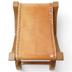 Rabbitman - curved x-framed stool with slung leather seats, adzed throughout the frame with signature Rabbit carving by Peter Heap of Wetwang