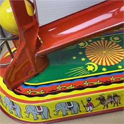 Twenty six tinplate models to include Ferris Wheel and Performing Circus Elephant, marked JW, further similar examples such as Duck on a Bike, Clown on Roller, Carousel; Popeye Tin Speedboat; Looney Tunes Wind Up Cars and Express Train; various international examples, MS107 Jumping Bambi, Pop Pop Boat, jumping frogs, pecking chickens etc; both boxed and loose