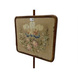 Victorian mahogany pole screen, with needlework panel depicting the Prince of Wales feathers and floral garland, vasiform pole with lappet decoration, on a concaved triangular platform with compressed bun feet