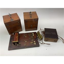 Heeling Error Instrument Patt.5 No.1613E (box numbered 1810E) with integrated spirit level D11cm; two walnut cased electric shock machines; and a similar board mounted electric shock machine (4)
