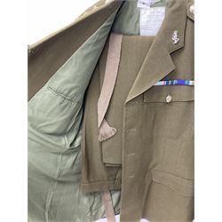 RAF Flight Lieutenant's uniform with peaked cap and WW2 ribbon bar; WW2 gas mask in blue canvas bag dated 1942; flying helmet date 1984; and British Army Major's uniform with Staybrite buttons and peaked cap