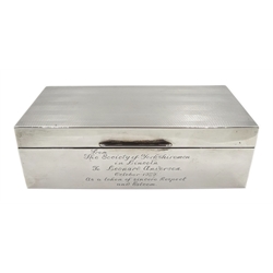 Silver cigarette box, engine turned decoration by William Neale & Son, Birmingham 1926, incribed 'From the Society of Yorkshiremen in Lincoln to Leonard Anderson...'