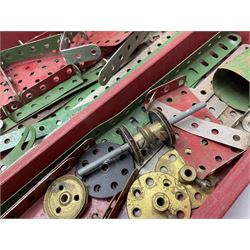 Meccano Set No.5 wooden box containing quantity of predominantly red and green sections, parts, brackets, wheels etc and instruction booklet
