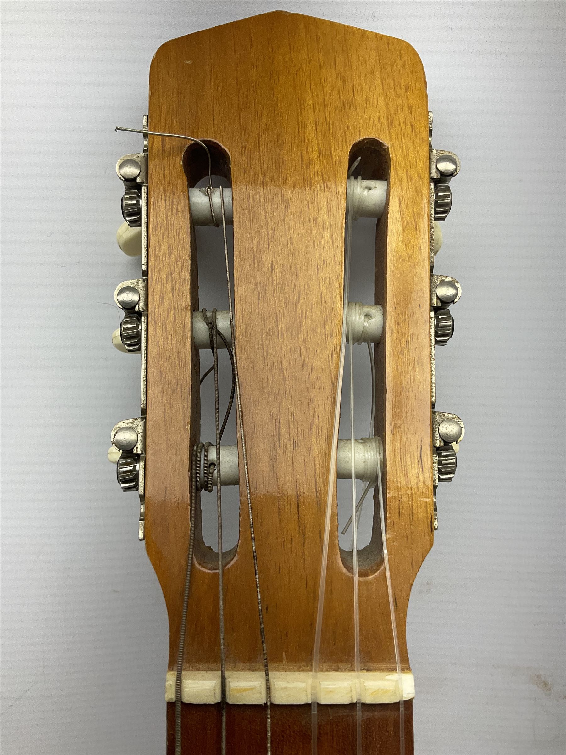 Encore black electric cut-away guitar L96cm; and Spanish Victor Garcia model 187 acoustic guitar, bears label dated 1972 L99cm; each in soft carrying case (2)