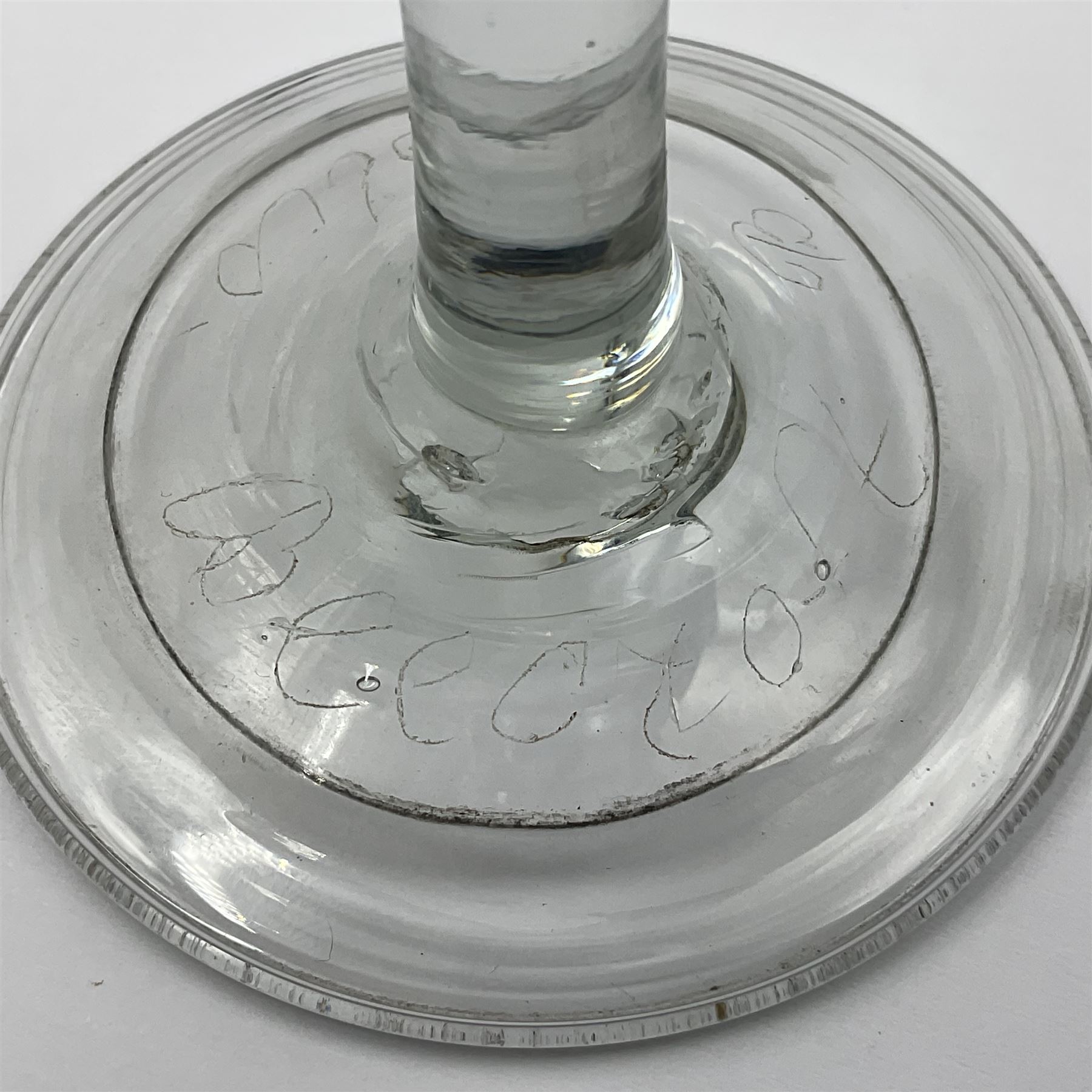 Pair of 18th century Jacobite style wine glasses, the ogee shaped bowls engraved with a single rose and sprig, plain stems upon conical folded feet H13cm