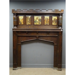  Early 20th century oak fire surround, architectural form with crenel style cornice, five painted panels depicting scenes of York, two turned column supports, pointed arched fire aperture, W159cm, H194cm, D20cm  