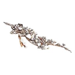 19th century gold and silver diamond and pearl en tremblant detachable brooch, the flower tremblant with a principal old cut diamond of approx 1.90 carat, the petals and stamen set with old cut and rose cut diamonds, total diamond weight approx 9.10 carat, to a foliate spray set set with further rose cut diamond and white / pink / cream pearls and ribbon tie