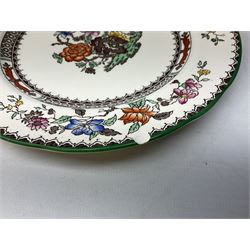 Copeland Spode part dinner service decorated in the Chinese Rose pattern, comprising lidded tureen, six dinner plates, six side plates, four bowls, and sauce boat and stand