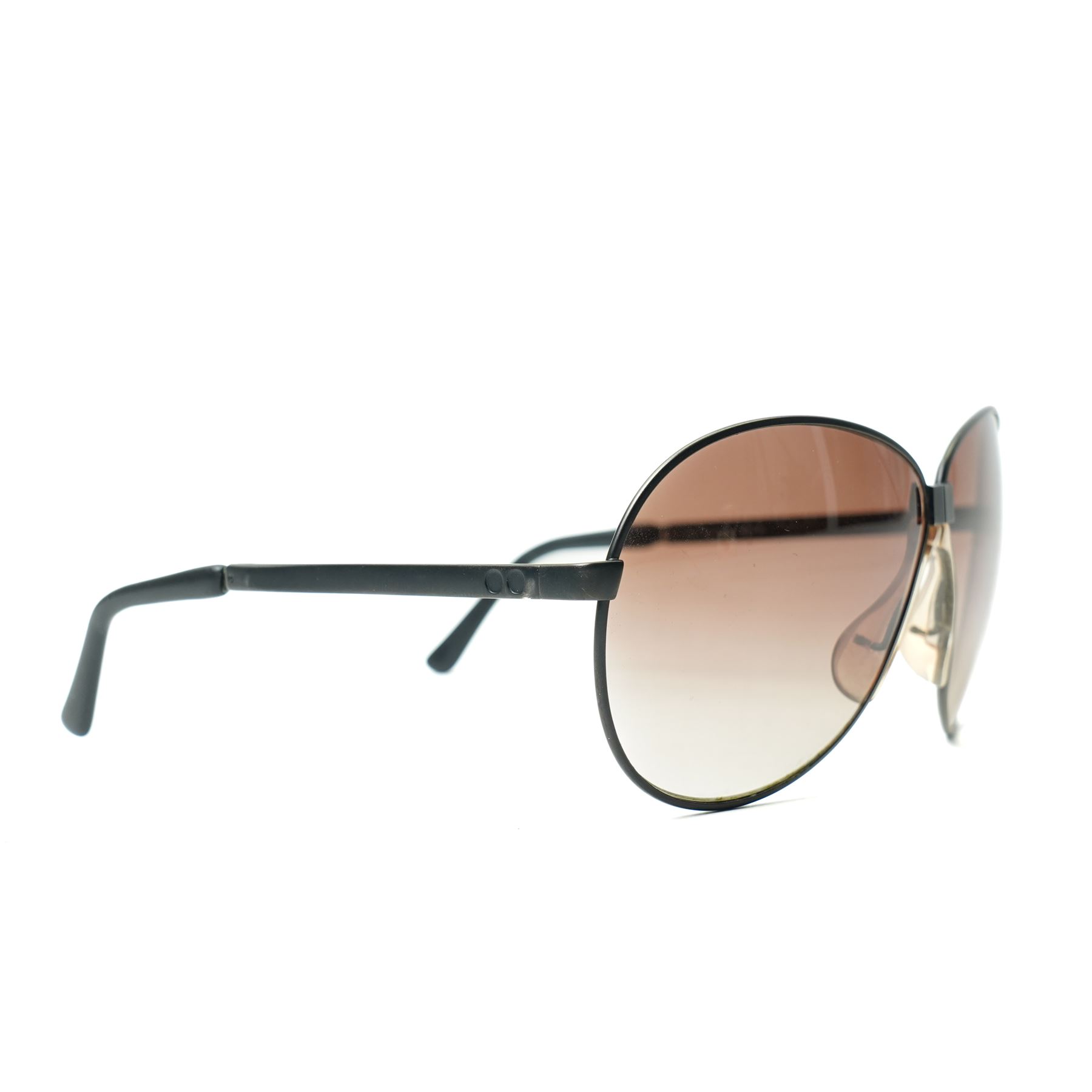 Carrera Porsche Design folding aviator sunglasses, black metal folding frame with brown gradient lenses, double bridge and adjustable nose pads, temples stamped Carrera Porsche Design, together with original Porsche Design case, circa 1980s