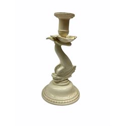 20th century Leeds creamware, comprising chestnut basket and stand, small tureen and cover, ladle, and associated stand, candlestick with stem modelled as a dolphin, teapot, tureen and cover in the form of a melon with fixed stand, and toast rack (toast rack a/f), each with impressed mark beneath. 