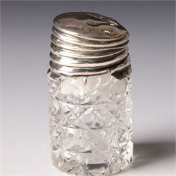 Silver upright photograph frame, aperture size 14cm x 9.5cm Birmingham 1919, pair of glass scent flasks with silver collars H16cm , two others, two dressing table jars with silver covers and a silver candlesticks