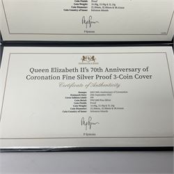 Two Queen Elizabeth II Solomon Islands silver proof three-coin covers, comprising 2021 'Queen Elizabeth II's 95th Birthday' and 2022 'Queen Elizabeth II's 70th Anniversary of Coronation', both in Harrington and Byrne folders