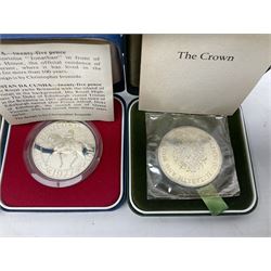Seven The Royal Mint United Kingdom sterling silver proof crown coins, comprising two 1972, three 1977, 1981 and 1993, all cased with certificates and a Queen Elizabeth II 2001 one ounce fine silver Britannia coin on card (8)