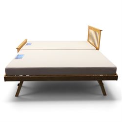 Contemporary light oak trundle bed, slatted headboard and footboard,  incorporating pull-out trundle bed on castors, complete with two memory foam mattresses