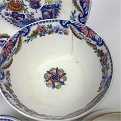 Early 19th century Spode Dolls House pattern tea wares, comprising teapot, twin handled sucrier and cover, milk jug, five teacups, two coffee cans, six saucers, stand, and shallow dish, decorated with a house and flowers in blue and orange, a number of pieces marked with pattern number 488, together with a quantity of other 19th century tea wares. 