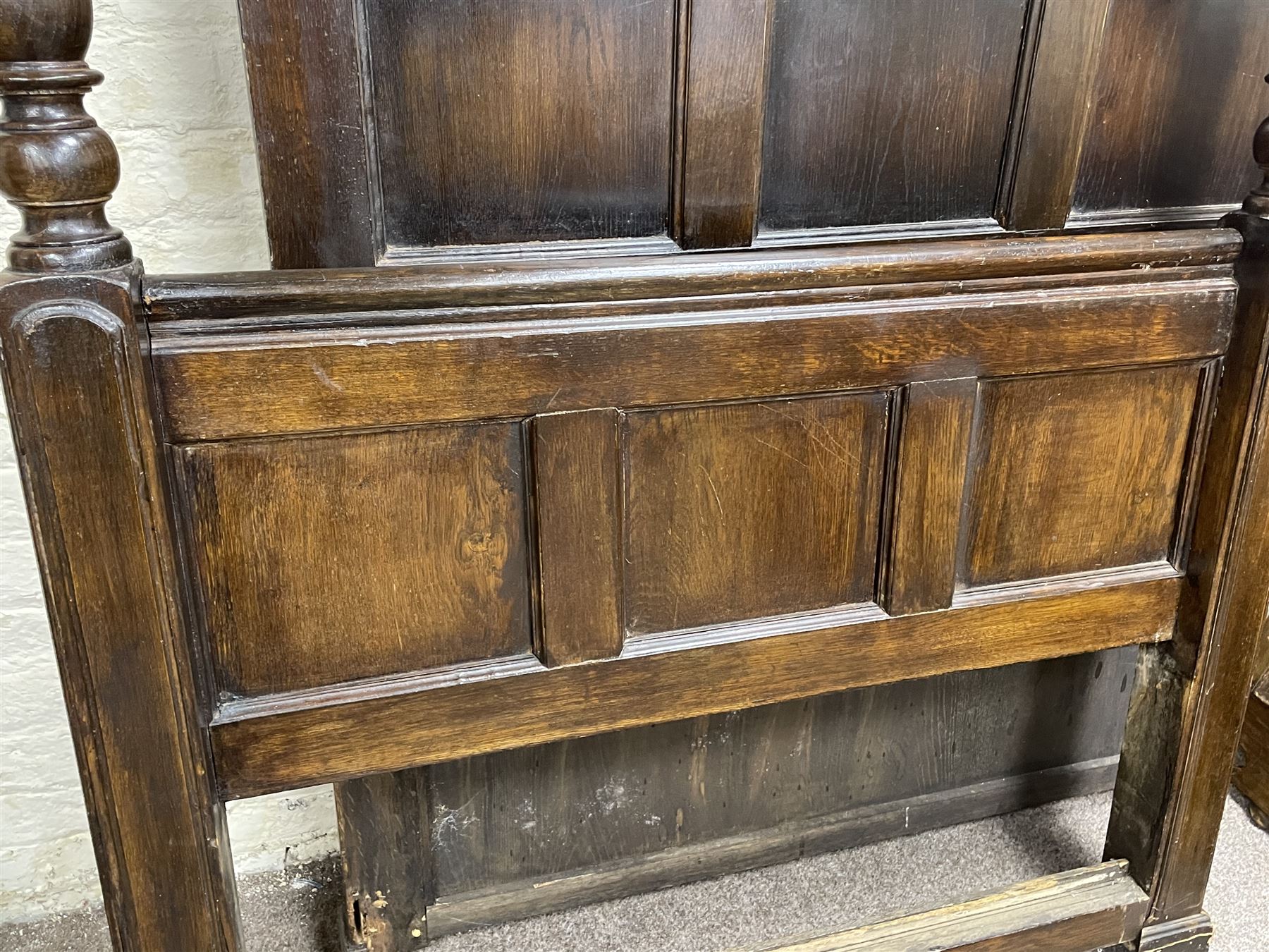 17th century style oak 4' four poster bed, high panelled back with projecting canopy cornice and panelled roof, turned posts with panelled front