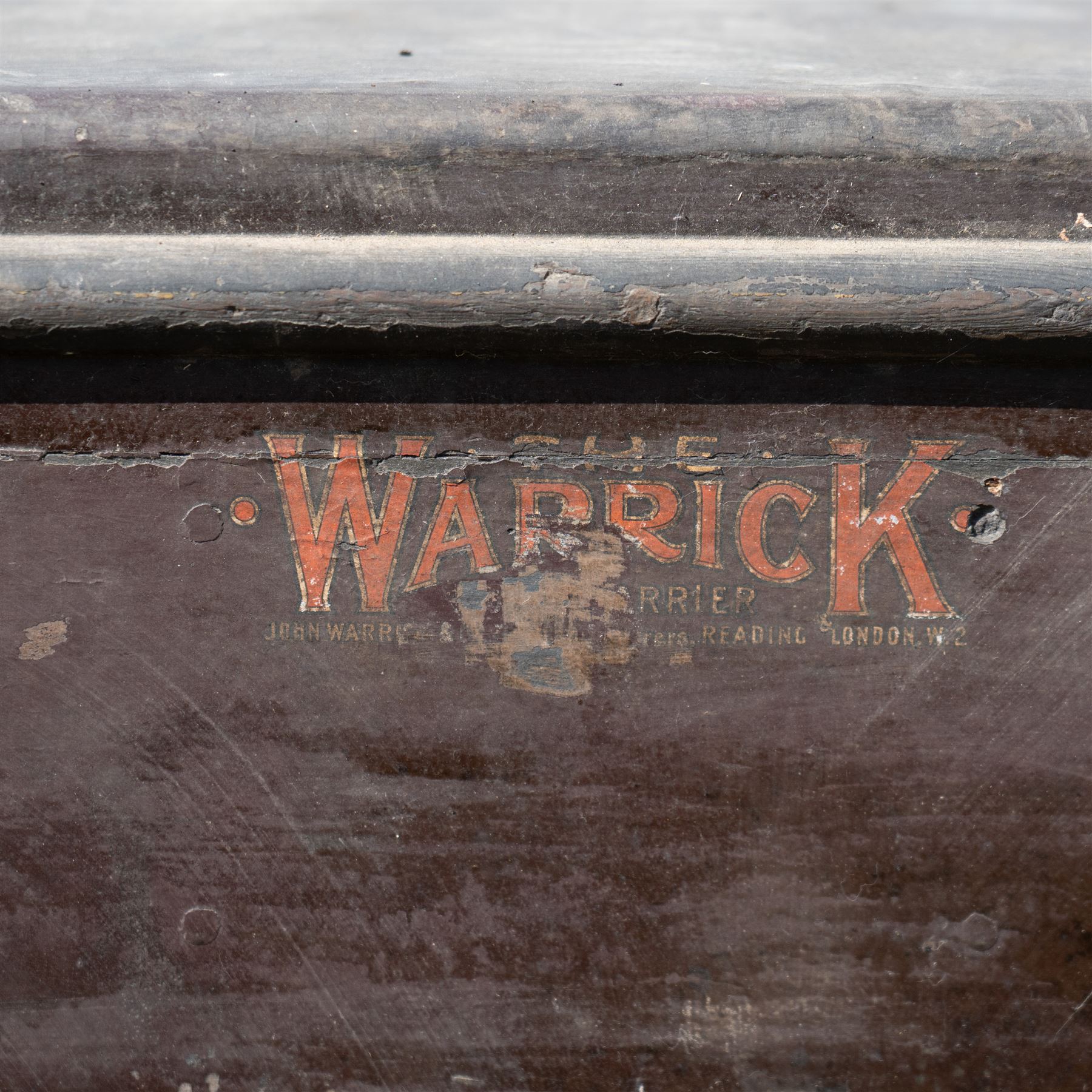 West of England Knitting Co. Ltd. Advertising Hand Cart

A rare and highly decorative late Victorian or Edwardian advertising hand cart, retaining its original black painted finish and gilt signwriting for West of England Knitting Co. Ltd., London, Penzance & St Ives. The enclosed box body is mounted on large cream painted wooden spoked wheels and fitted with rear push handles, allowing the cart to be manoeuvred by hand. Intended as a promotional and delivery vehicle for one of Britain's best known knitwear manufacturers, the cart survives as an evocative piece of commercial advertising history. The interior remains accessible via twin rear doors, while traces of the original maker's transfer for the Warwick Carrier are visible. An unusual and attractive display piece suited to collectors of advertising, transport memorabilia and social history.

Features

• Original hand painted gilt signwriting for West of England Knitting Co. Ltd.
• Advertising panels referencing London, Penzance and St Ives
• Enclosed wooden box body with twin rear access doors
• Original black painted finish with period lettering
• Large cream painted wooden spoked wheels with iron tyres
• Rear push handles for hand propelled operation
• Warwick Carrier maker's transfer remains visible
• Original undercarriage and running gear
• Attractive display piece with strong commercial advertising appeal
• Suitable for museum, retail, interior or collection display

Dimensions:
Overall length: 190 cm
Body length: 125 cm
Overall width: 140 cm
Body width: 100 cm
Height: 150 cm

Wheel Diameter:
Wheels: 92 cm