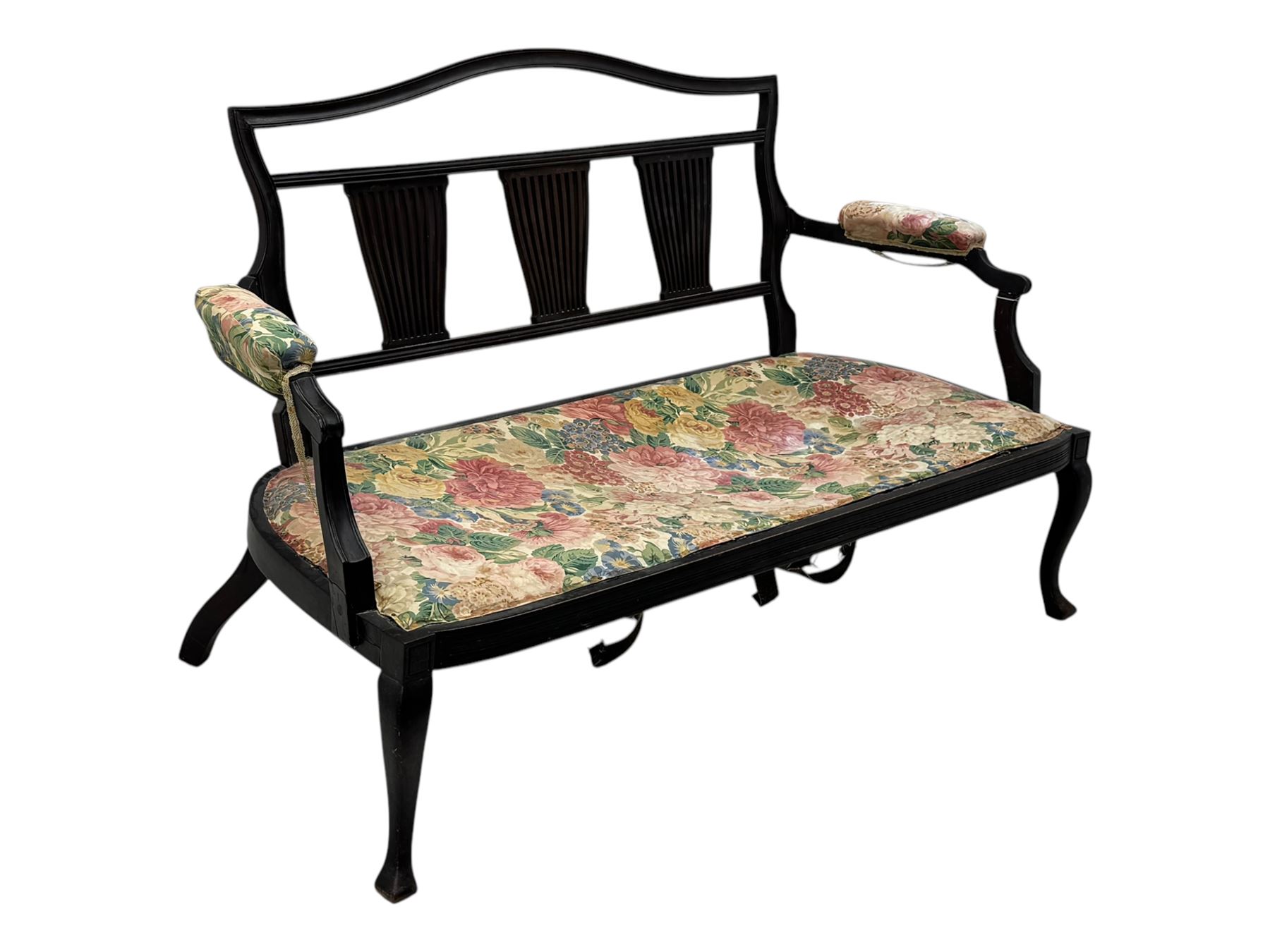 Edwardian mahogany three seater settee, upholstered in floral fabric. Shield back with padded armrests and cabriole legs  